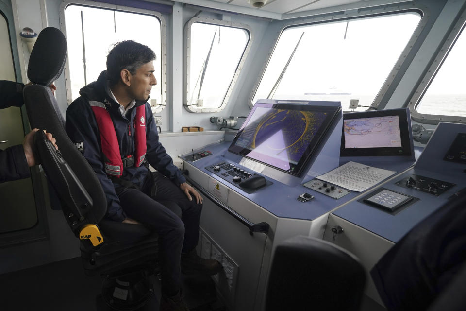 Britain's Prime Minister Rishi Sunak onboard Border Agency cutter HMC Seeker during a visit to Dover, England, Monday, June 5, 2023 ahead of a press conference to update the nation on the progress made in the six months since he introduced the Illegal Migration Bill under his plans to "stop the boats". (Yui Mok/Pool Photo via AP)