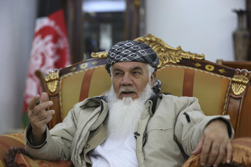 Former Afghan Cabinet Minister Ismail Khan, speaks during an interview with the Associated Press in Herat province, western of, Afghanistan, Wednesday, Feb. 20, 2019. A powerful political leader, who was previously tapped by some to lead Afghanistan’s negotiating team with the Taliban, warned Afghanistan’s president Wednesday against squandering an opportunity to find a peaceful settlement to the country’s latest war that is now into its 18th year. (AP Photo/Rahmat Gul)