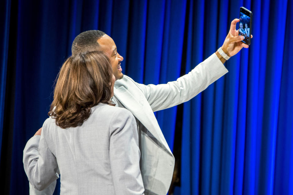 Host Terrence Jenkins and Vice President Kamala Harris pose for a photo at Hampton University on Thursday, Sept. 14, 2023, in Hampton, Va. (AP Photo/John C. Clark)