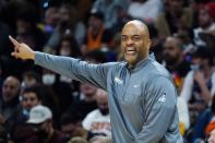 Washington Wizards head coach Wes Unseld Jr. shouts instructions to his players during the second half of an NBA basketball game against the Phoenix Suns Thursday, Dec. 16, 2021, in Phoenix. The Suns won 118-98. (AP Photo/Ross D. Franklin)