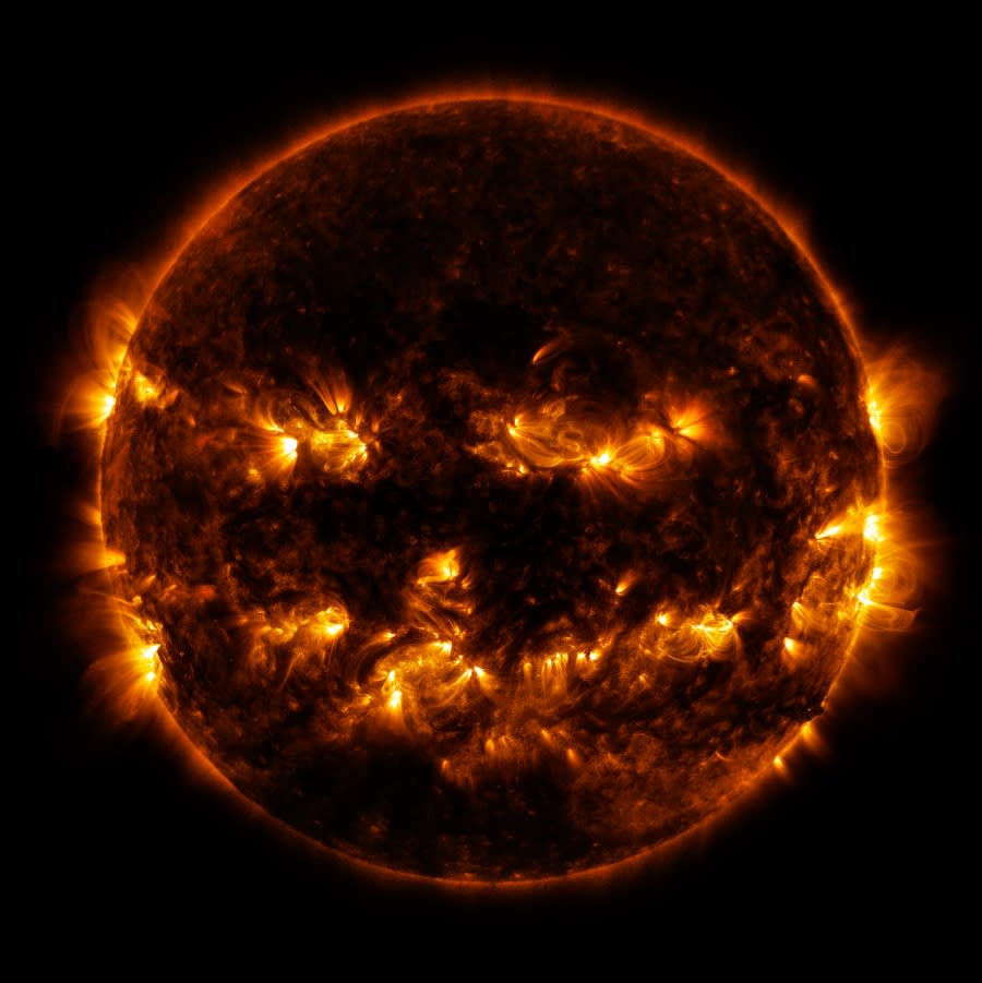 NASA's Solar Dynamics Observatory spacecraft took a picture of the Sun in 2014 that makes it look like a jack-o'-lantern