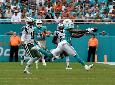 Miami Dolphins cornerback Xavien Howard (25) breaks up a pass as New York Jets wide receiver Jermaine Kearse (10) looks on during the second half at Hard Rock Stadium - Credit: Steve Mitchell/USA Today