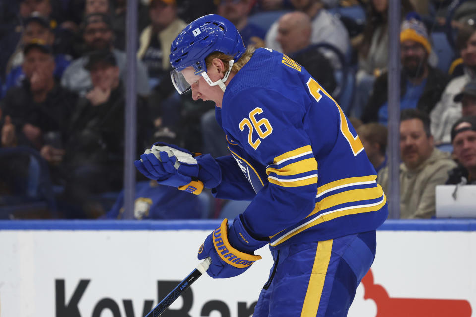 Buffalo Sabres defenseman Rasmus Dahlin (26) reacts after being hit into the boards during the second period of an NHL hockey game against the St. Louis Blues, Saturday, Feb. 10, 2024, in Buffalo, N.Y. (AP Photo/Jeffrey T. Barnes)