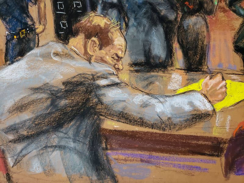 Film producer Harvey Weinstein takes notes as the jury begin deliberations in New York