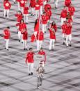 <p>Canada made a statement with bright red athletic jackets, which shined on TV.</p>