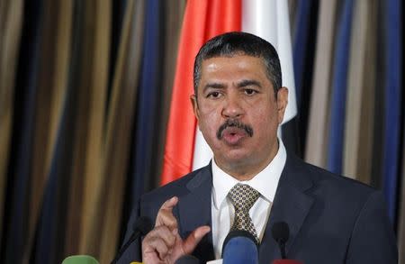 Yemen's newly appointed Prime Minister Khaled Bahah listens to a reporter's questions at a news conference after his cabinet was sworn-in at the Presidential Palace in Sanaa November 9, 2014. REUTERS/Mohamed al-Sayaghi