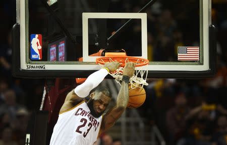 Jan 19, 2017; Cleveland, OH, USA; Cleveland Cavaliers forward LeBron James (23) slam dunks during the second half against the Phoenix Suns at Quicken Loans Arena. Mandatory Credit: Ken Blaze-USA TODAY Sports