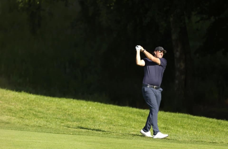 Phil Mickelson plays a shot on the 15th hole during day two of the LIV Golf Invitational Series at the Centurion Club, Hertfordshire (Steven Paston/PA) (PA Wire)