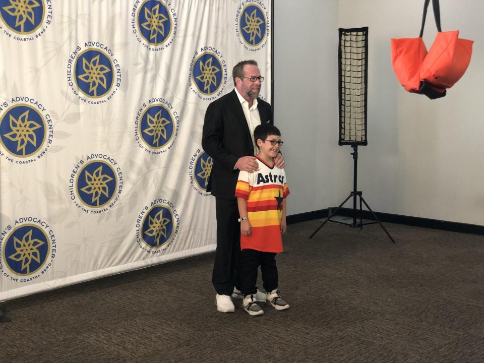 Hall of Famer and former Astros first baseman Jeff Bagwell takes a photo with a fan during the Children's Advocacy Center of the Coastal Bend Garden of Hope Gala at the Solomon Ortiz Center in downtown Corpus Christi.