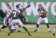 Aug 10, 2018; East Rutherford, NJ, USA; New York Jets quarterback Sam Darnold (14) looks to pass as wide receiver Tre McBride (7) runs a route during the first half against the Atlanta Falcons at MetLife Stadium. Mandatory Credit: Vincent Carchietta-USA TODAY Sports