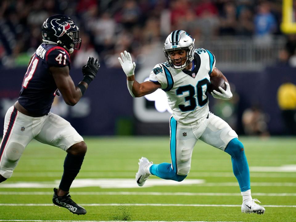 Chuba Hubbard makes a play against the Houston Texans.