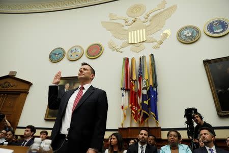 FBI Deputy Assistant Director Peter Strzok is sworn in prior to testifying before House Committees on the Judiciary and Oversight & Government Reform joint hearing on "Oversight of FBI and DOJ Actions Surrounding the 2016 Election” in Washington, U.S., July 12, 2018. REUTERS/Joshua Roberts