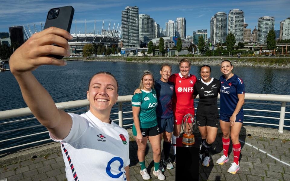 Zoe Aldcroft of England takes a selfie with (L-R) Edel McMahon of Ireland, Kate Zachary of the United States, Tyson Beukeboom of Canada, Ruahei Demant of New Zealand, and Marine Ménager of France during the captain's photocal ahead of WXV1