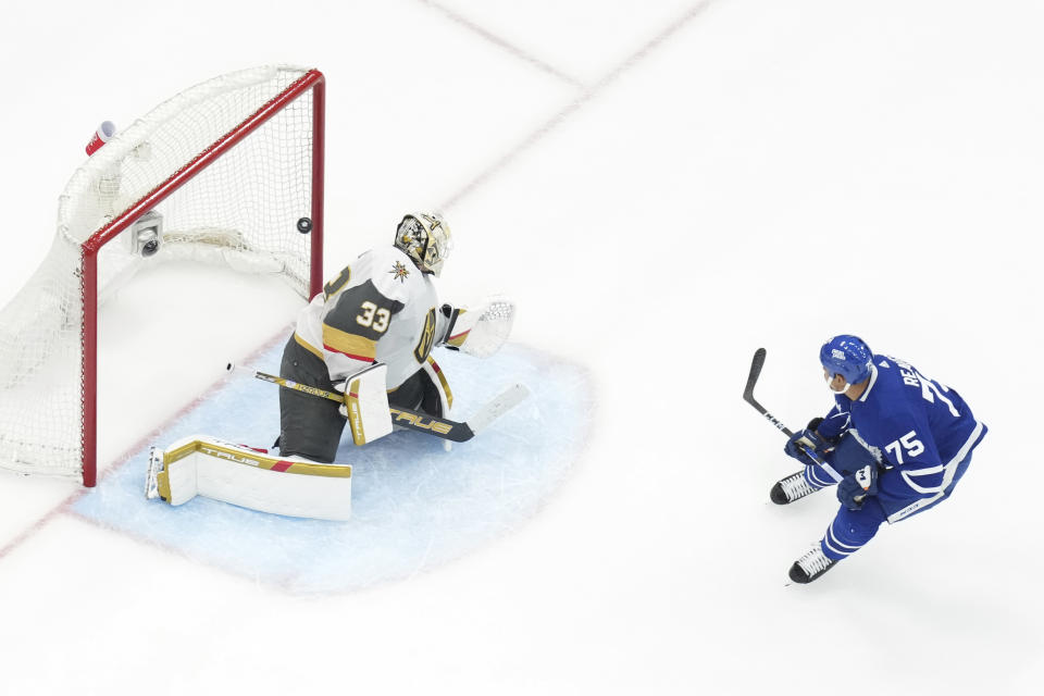 Toronto Maple Leafs' Ryan Reaves (75) scores against Vegas Golden Knights goaltender Adin Hill (33) during the third period of an NHL hockey game in Toronto, on Tuesday, Feb. 27, 2024. (Chris Young/The Canadian Press via AP)