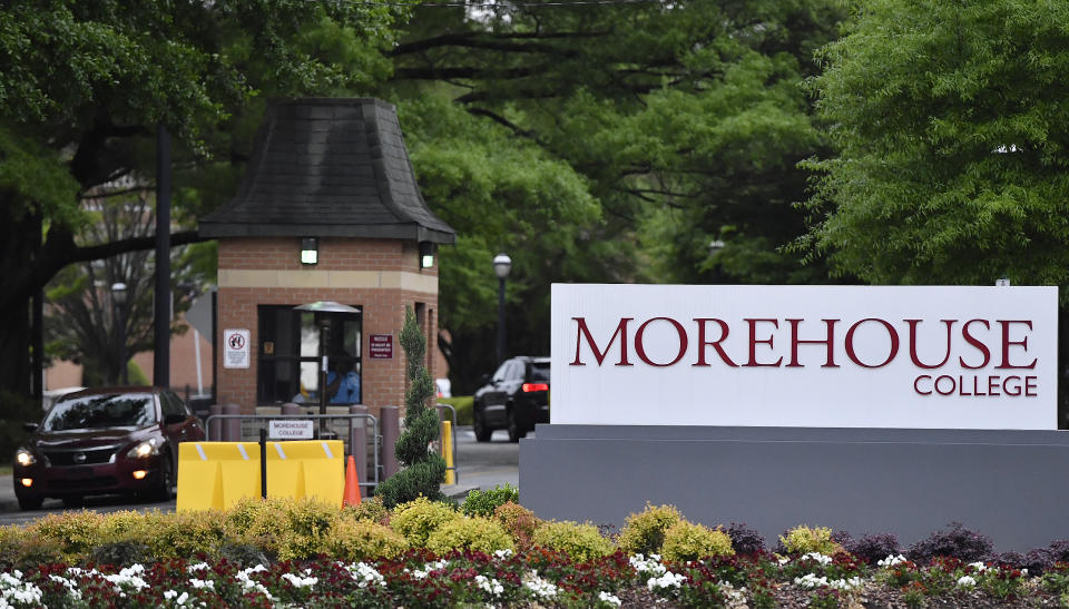 FILE - In this April 12, 2019, file photo, people enter the campus of Morehouse College in Atlanta. A new center for training Black entrepreneurs will be opening in Atlanta as part of a collaboration announced Monday, Feb. 22, 2021, between Spelman College, Morehouse College and an advocacy organization made up of business leaders. (AP Photo/Mike Stewart, File)