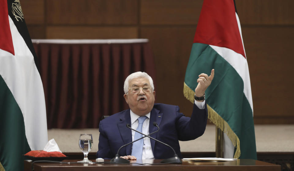 Palestinian President Mahmoud Abbas heads a leadership meeting at his headquarters, in the West Bank city of Ramallah, Tuesday, May 19, 2020. (Alaa Badarneh/Pool Photo via AP)