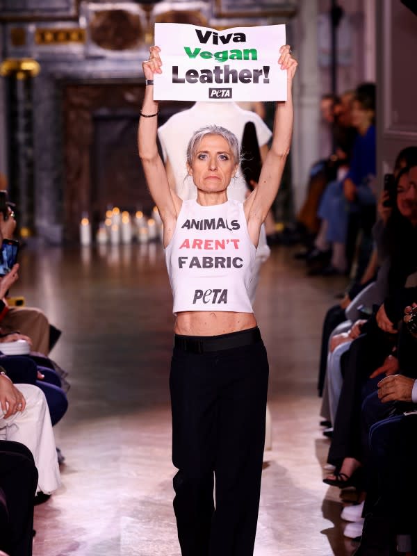 A PETA protester on the Victoria Beckham Fall 2024 runway<p>Photo: Marc Piasecki/Getty Images</p>