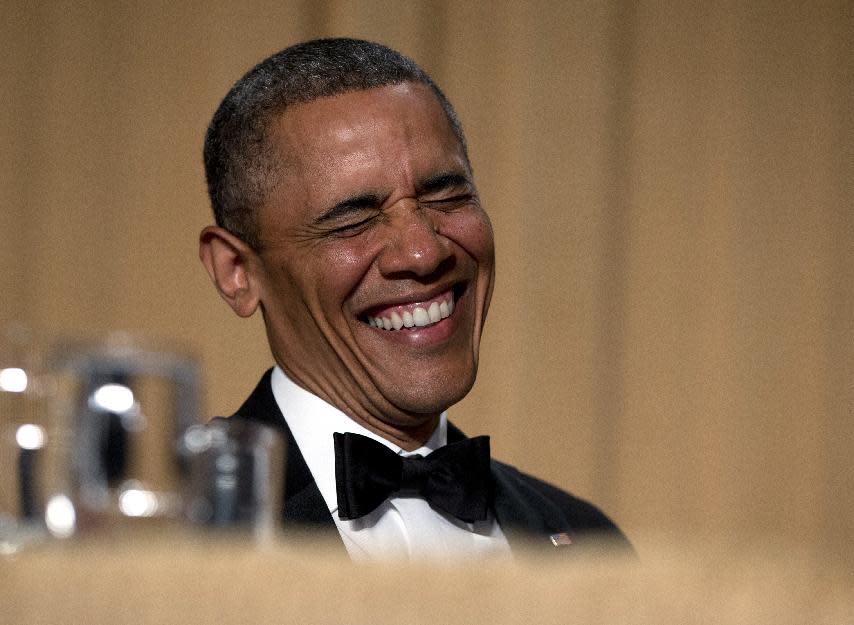 FILE - In this April 27, 2013 file photo, President Barack Obama laughs as he attends the White House Correspondents' Association Dinner at the Washington Hilton Hotel in Washington. Obama was set to join journalists, government officials, politicians and media personalities Saturday night at the White House Correspondents' Association dinner for an evening of humor and celebrity gazing that has become an annual tradition in the nation’s capital. (AP Photo/Carolyn Kaster)