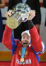 Russia's captain Ilya Nikulin celebrates with the trophy of the IIHF International Ice Hockey World Championship after winning the final game between Russia and Slovakia in Helsinki on May 20, 2012. Russia defeated team Slovakia 6-2 . AFP PHOTO/ ALEXANDER NEMENOVALEXANDER NEMENOV/AFP/GettyImages