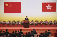 China's President Xi Jinping gives a speech following a swearing-in ceremony to inaugurate the city's new government in Hong Kong Friday, July 1, 2022, on the 25th anniversary of the city's handover from Britain to China. (Selim Chtayti/Pool Photo via AP)