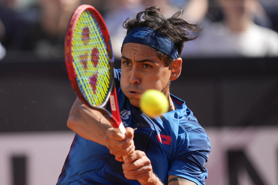 Chile's Alejandro Tabilo returns the ball to Germany's Alexander Zverev during a men's tennis semifinal match at the Italian Open tennis tournament, in Rome, Friday, May 17, 2024. (AP Photo/Andrew Medichini)