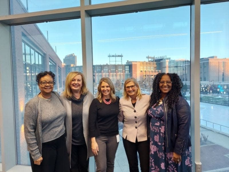 From left, African Heritage Inc. board member Adonica Randall, NEW Manufacturing Alliance Executive Director Ann Franz, TechSpark Northeast Wisconsin Director Michelle Schuler, New North Inc. CEO Barb LaMue and African Heritage Inc. board member Dr. Sabrina Robins pose together in TitletownTech, west of Lambeau Field.
