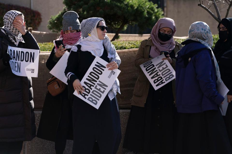 A group of women join Muslim Michigan leaders as they hold a rally at the Patrick V. McNamara Federal Building on Thursday, Nov. 9, 2023 to announce abandoning a future vote for President Joe Biden because he is refusing to call for a ceasefire in Gaza.