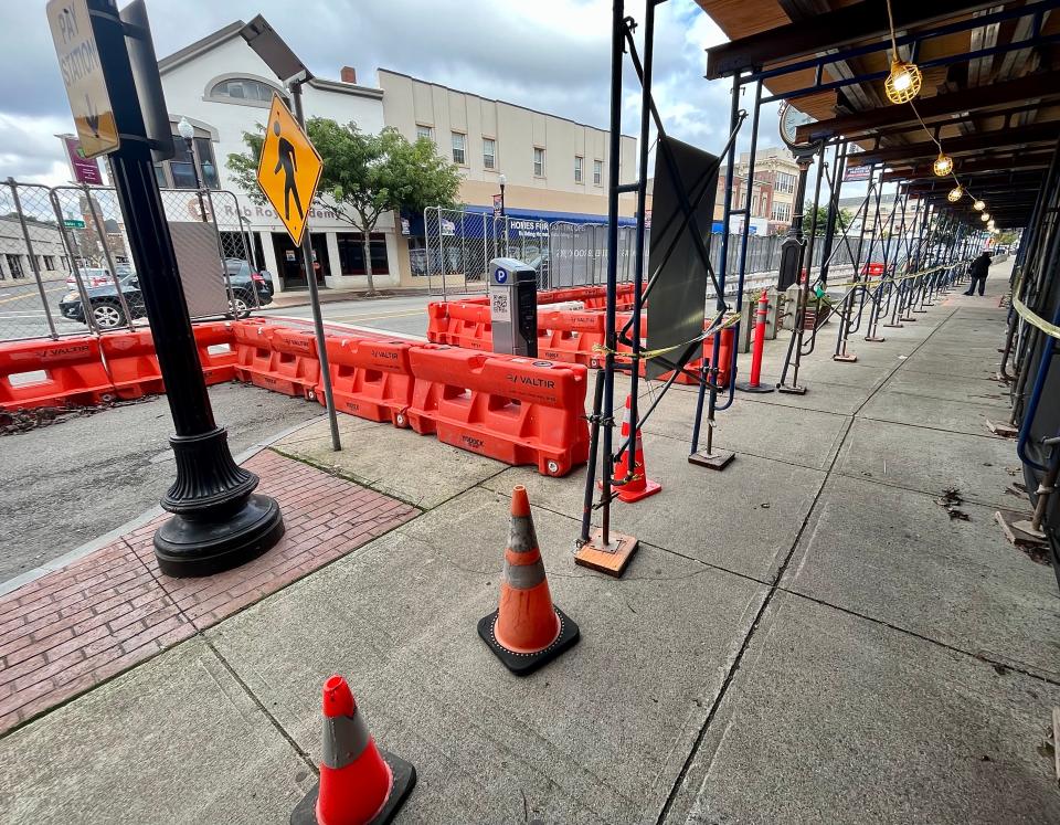 A pedestrian crosswalk downtown at Main and School streets can now be used since the city reopened the sidewalk running past the Union Block buildings on Main Street.