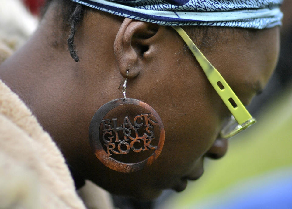 People gather in Cardiff, Wales, Saturday June 6, 2020, to protest against the recent killing of George Floyd by police officers in Minneapolis, USA, that has led to protests in many countries and across the US. A US police officer has been charged with the death of George Floyd. (Ben Birchall/PA via AP)