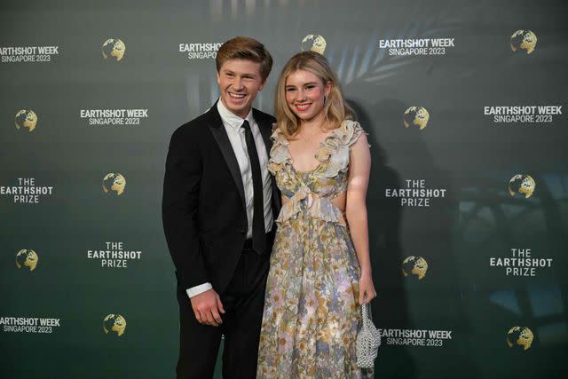 <p>MOHD RASFAN/AFP via Getty</p> Robert Irwin and his girlfriend Rorie Buckey arrive at the Earthshot Prize ceremony in Singapore on Tuesday