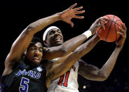 <p>Tariq Owens #11 of the Texas Tech Red Raiders grabs the rebound away from CJ Massinburg #5 of the Buffalo Bulls during the second half of the second round game of the 2019 NCAA Men’s Basketball Tournament at BOK Center on March 24, 2019 in Tulsa, Oklahoma. (Photo by Harry How/Getty Images) </p>