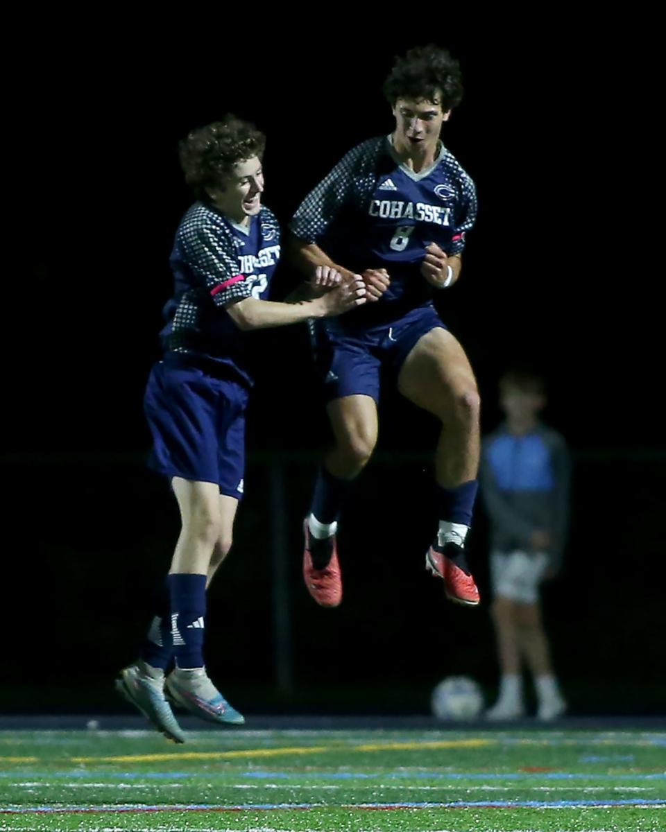 Cohasset's Nathan Askjaer celebrates his goal with Cohasset's Michael Giglio to give Cohasset the 2-0 lead during second half action of their game at Cohasset Middle High School on Wednesday, Oct. 25, 2023. Cohasset would go on to win 3-0 in South Shore League action.