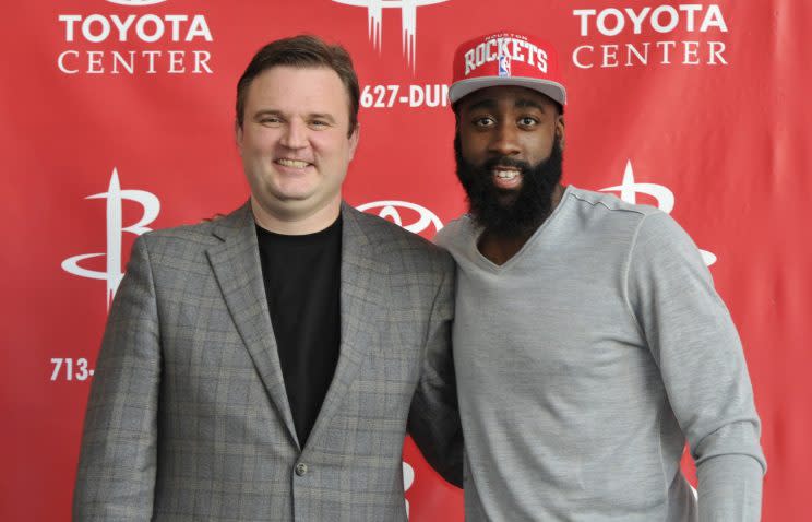 Rockets GM Daryl Morey poses with James Harden. (Getty)