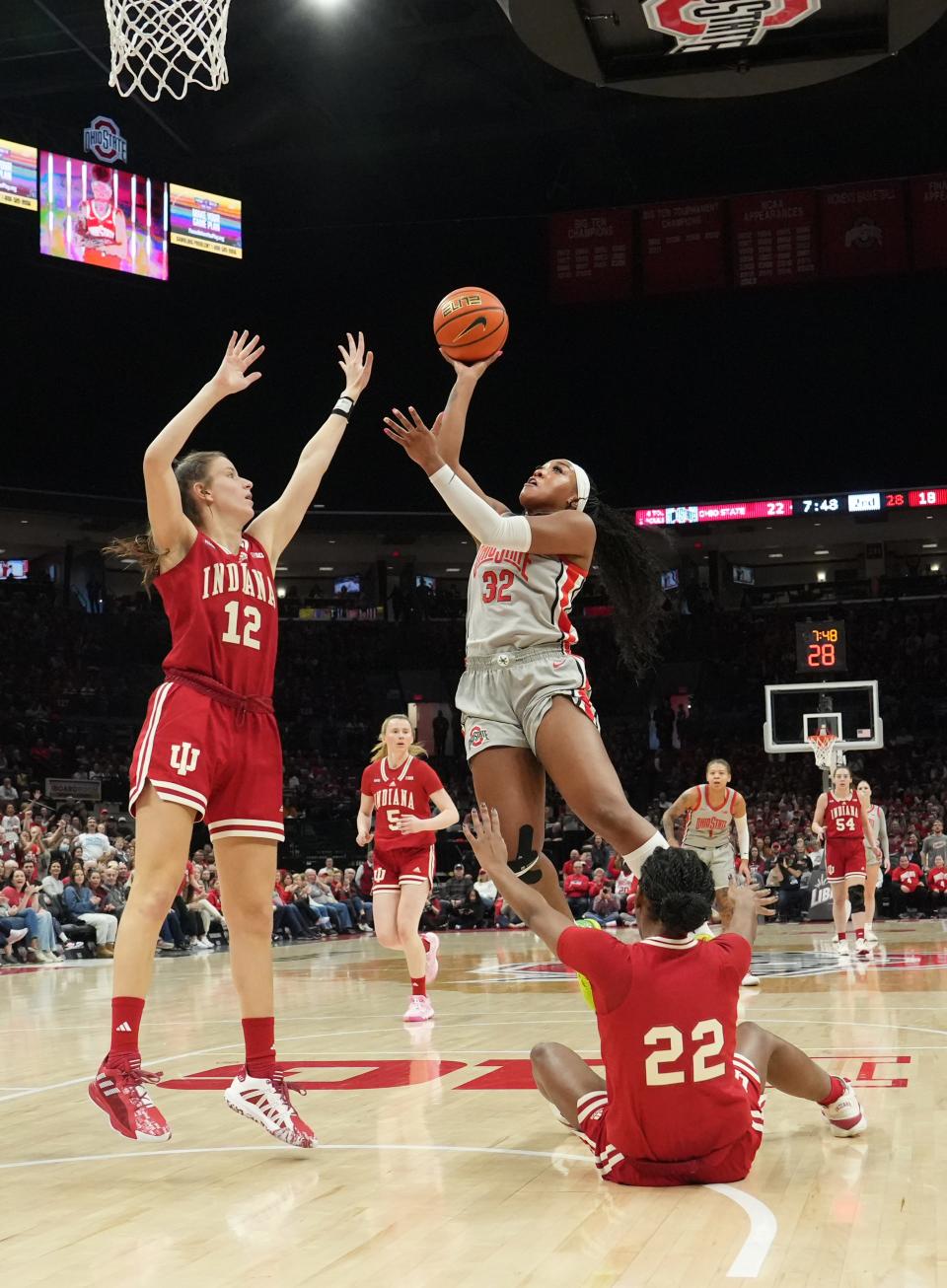 Ohio State forward Cotie McMahon shoots against Indiana's Yarden Garzon (12) and Chloe Moore-McNeil on Sunday. McMahon had 20 points and seven rebounds in the game.