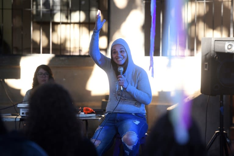 Adriana Torres performs her monologue during the closing of a stand-up comedy workshop at the El Buen Pastor women's prison in Asuncion on August 10, 2024. The Paraguayan NGO Corazon Libre (Free Heart) held a two-month stand-up comedy workshop with the participation of a dozen inmates to help them reintegrate into the labor market upon their release from prison. (DANIEL DUARTE)