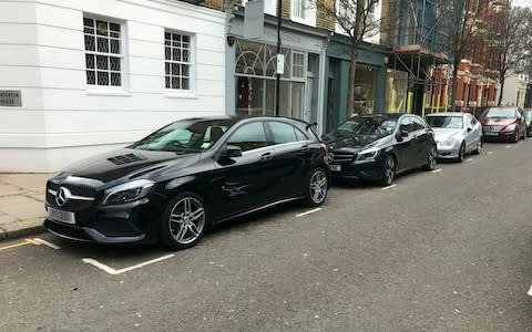 De Silva and his accomplice, who is still on the run, targeted these two Mercedes A200s parked on the street in Chelsea - Credit: SWNS