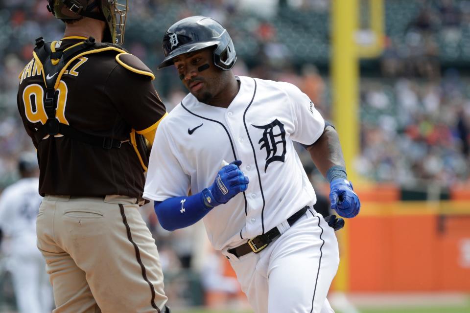 Detroit Tigers infielder Andy Ibáñez hits a home run during the game against the San Diego Padres at Comerica Park on July 23, 2023 in Detroit, Michigan.