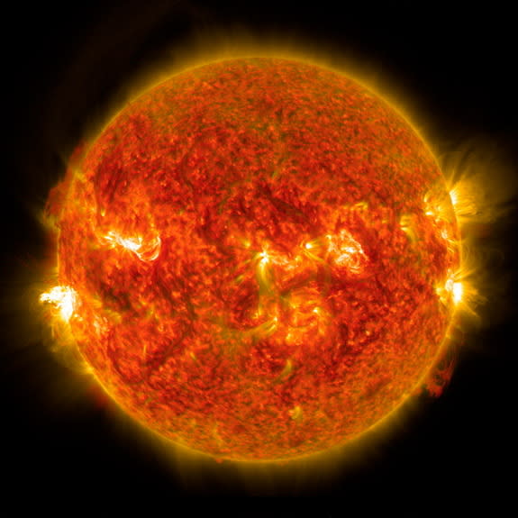 A bright solar flare leaps from the left side of the sun in this new photo. NASA's Solar Dynamics Observatory obtained the image on Aug. 24, 2014.