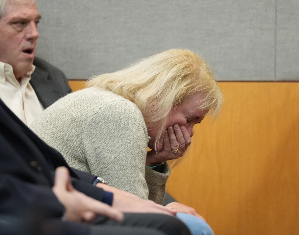 The mother of Daniel Perry cries Friday in court after he was convicted of murder in Garrett Foster's slaying.