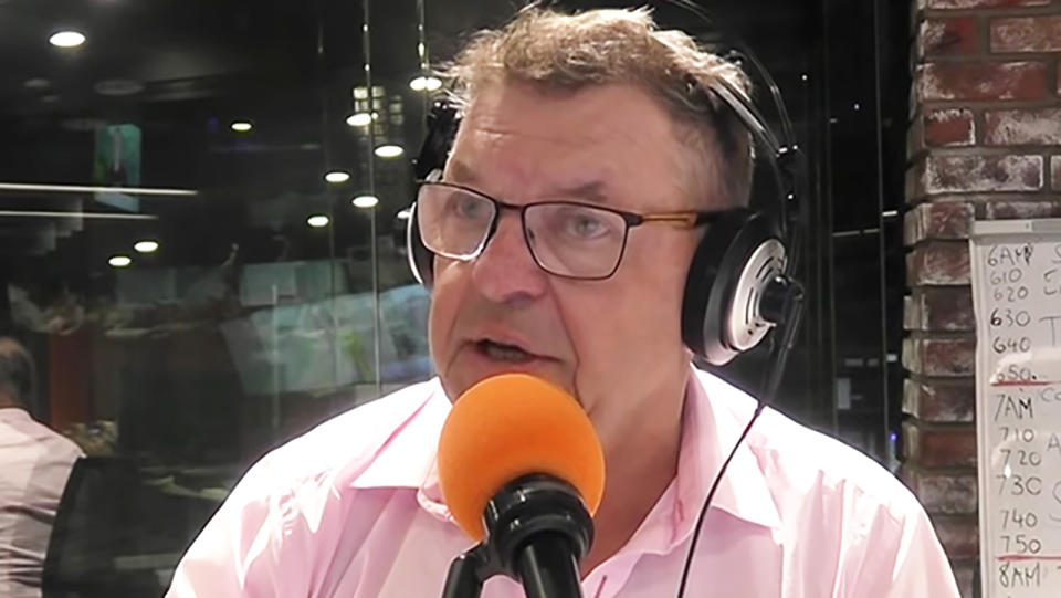 Media commentator Steve Price is pictured broadcasting for radio station Triple M.