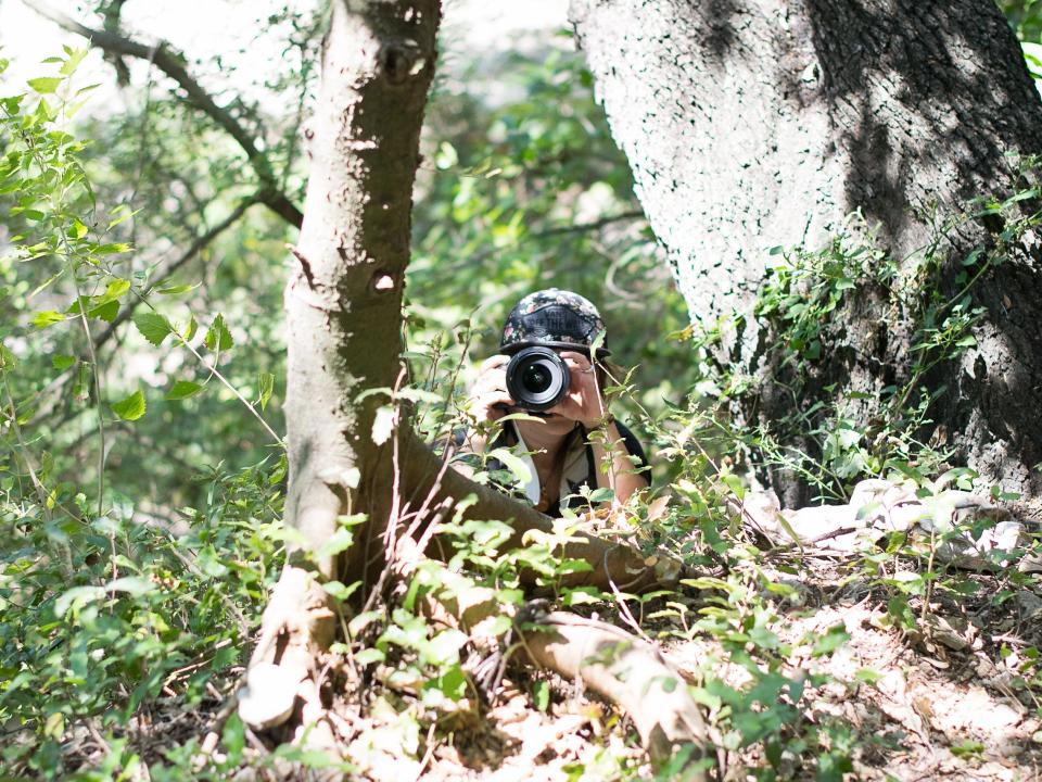 Author with a camera in the wood