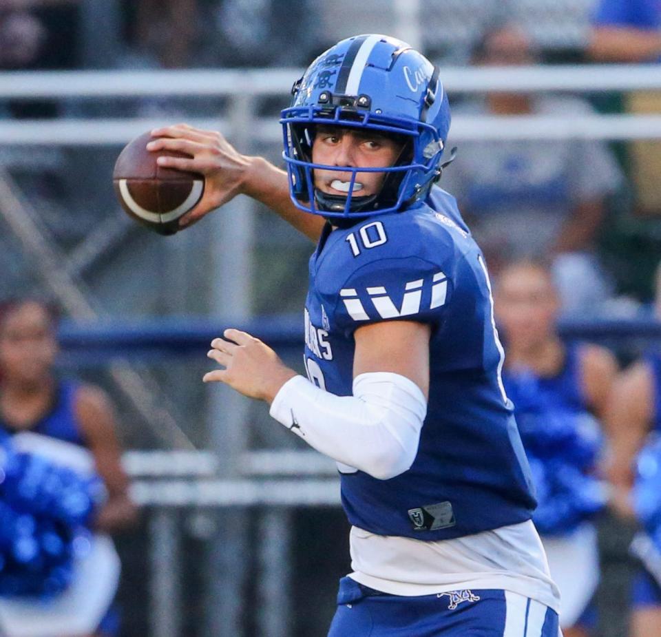 Middletown quarterback Austin Troyer throws in the first half of the Cavaliers' 41-7 win against Sussex Central at Cavaliers Stadium, Friday, Sept. 8, 2023.