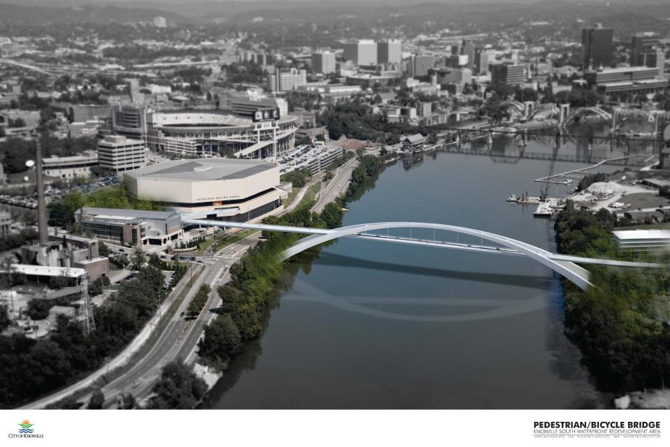 A concept drawing shows a pedestrian bridge connecting South Knoxville to the University of Tennessee's Thompson-Boling Arena.