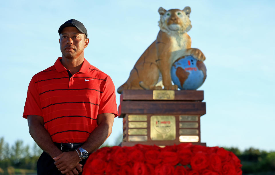 NASSAU, BAHAMAS - DECEMBER 03: Tournament host Tiger Woods poses with the trophy during the final round of the Hero World Challenge at Albany Golf Course on December 03, 2023 in Nassau, . (Photo by Mike Ehrmann/Getty Images,)