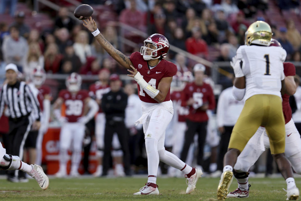 Stanford quarterback Ashton Daniels (14) throws a pass against Notre Dame during the first half of an NCAA college football game in Stanford, Calif., Saturday, Nov. 25, 2023. (AP Photo/Jed Jacobsohn)