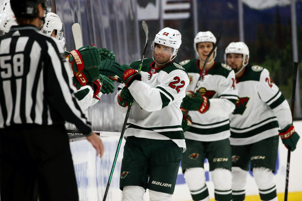 Kevin Fiala (22) celebrates his goal with teammates on the bench during the second period of an NHL hockey game against Anaheim Ducks Saturday, Feb. 20, 2021, in Anaheim, Calif. (AP Photo/Ringo H.W. Chiu)