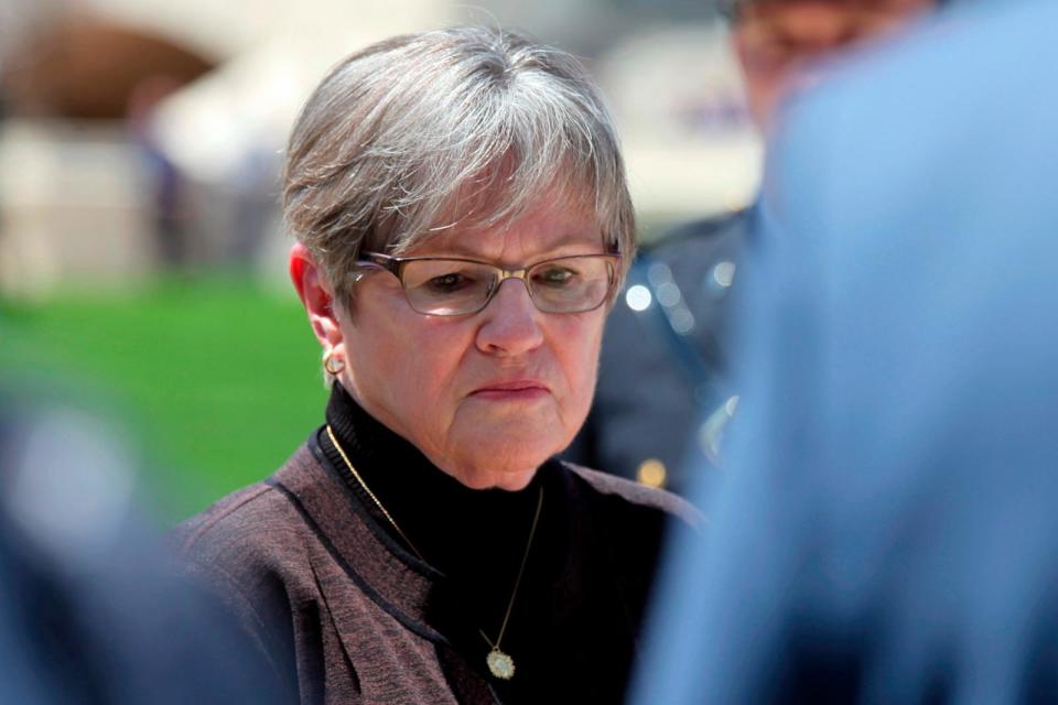 PHOTO: Kansas Gov. Laura Kelly participates in a ceremony honoring fallen law enforcement officers, May 3, 2024 outside the Statehouse in Topeka, Kan.  (John Hanna/AP)