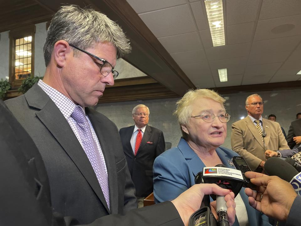 Indiana Republican Senate President Pro-Tem Rodric Bray, left, and Sen. Sue Glick of LaGrange, speak with reporters, Friday, Aug. 5, 2022, in Indianapolis, after the state becomes the first in the nation to pass an abortion bill in its Legislature after the U. S. Supreme Court overturned Roe v. Wade in June. (AP Photo/Arleigh Rodgers)