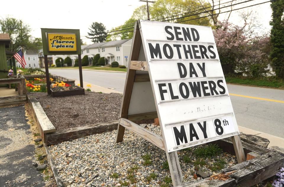 A sign at McKenna's Flowers & Plants in Norwich reminding people of Mother's Day this Sunday.