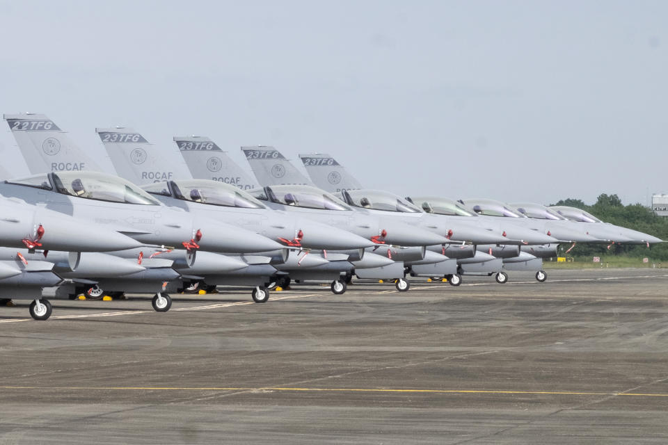 Newly commissioned upgraded F-16V fighter jets are seen at Air Force base in Chiayi in southwestern Taiwan Thursday, Nov. 18, 2021. Taiwan has deployed the most advanced version of the F-16 fighter jet in its Air Force, as the island steps up its defense capabilities in the face of continuing threats from China. (AP Photo/Johnson Lai)